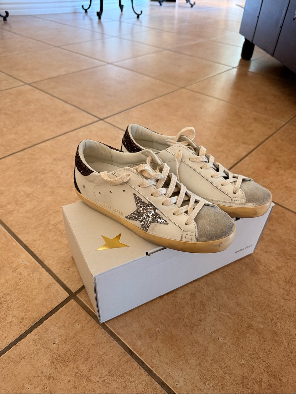 Golden Goose Superstar with silver glitter star and brown/burgundy heel tab